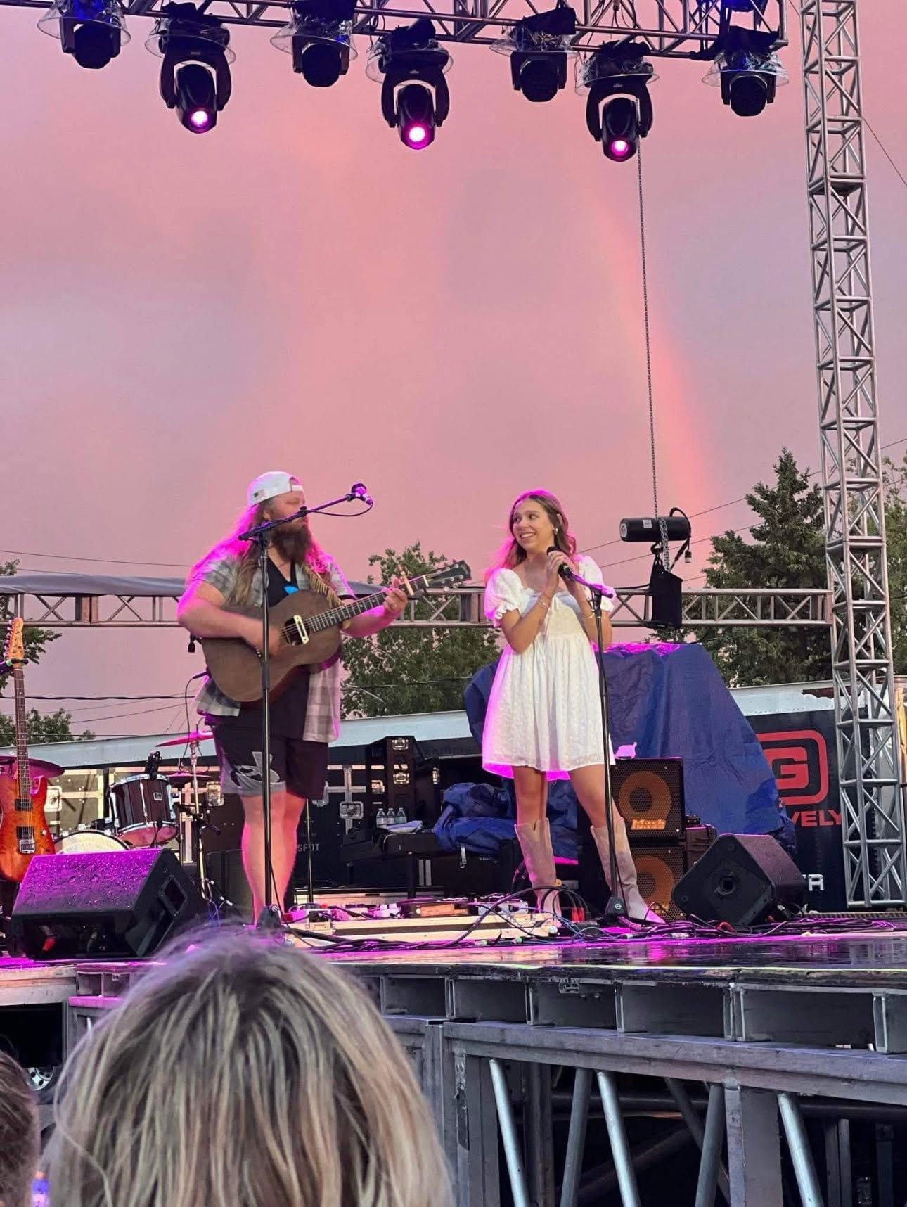 Eva performing at an outdoor show